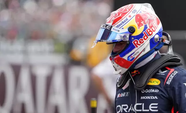 Red Bull driver Max Verstappen of the Netherlands celebrates his pole position after the qualifying session at the Silverstone racetrack, ahead of the British Formula One Grand Prix, in Silverstone, England, Saturday, July 5, 2025. (AP Photo/Darko Bandic)