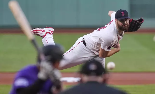 Boston Red Sox pitcher Lucas Giolito delivers during the first inning of a baseball game against the Colorado Rockies at Fenway Park, Wednesday, July 9, 2025, in Boston. (AP Photo/Charles Krupa)