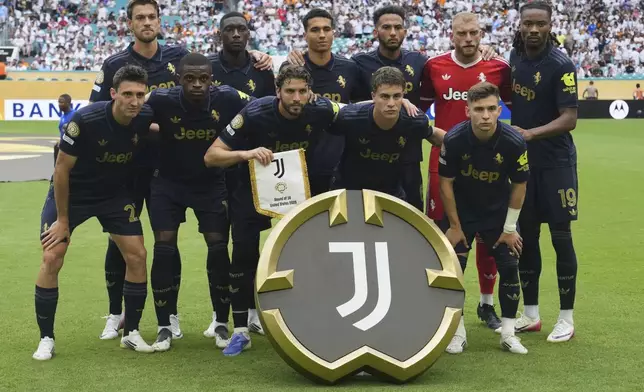 Juventus players pose before the Club World Cup round of 16 soccer match between Real Madrid and Juventus in Miami Gardens, Fla., Tuesday, July 1, 2025. (AP Photo/Lynne Sladky)