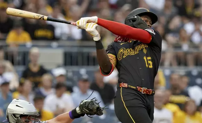 Pittsburgh Pirates' Oneil Cruz hits a two-run home run during the second inning of a baseball game against the Arizona Diamondbacks Saturday, July 26, 2025, in Pittsburgh. (AP Photo/Matt Freed)
