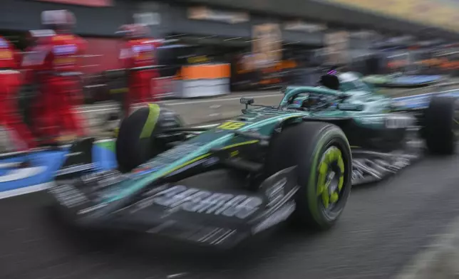 Aston Martin driver Lance Stroll of Canada leaves the pit lane during the British Formula One Grand Prix race at the Silverstone racetrack in Silverstone, England, Sunday, July 6, 2025. AP Photo/Andrej Isakovic, Pool)