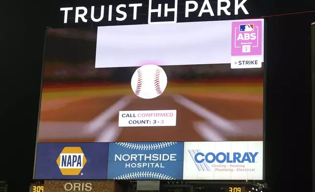 Miami's Kyle Stowers challenge is being reviewed during eighth inning at the MLB baseball All-Star game between the American League and National League, Tuesday, July 15, 2025, in Atlanta. (AP Photo/Brynn Anderson)