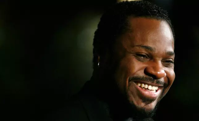 FILE - Actor Malcolm-Jamal Warner is seen on the red carpet of the Mark Twain Prize for American Humor, honoring Bill Cosby, in Washington, Oct. 26, 2009. (AP Photo/Jacquelyn Martin, File)