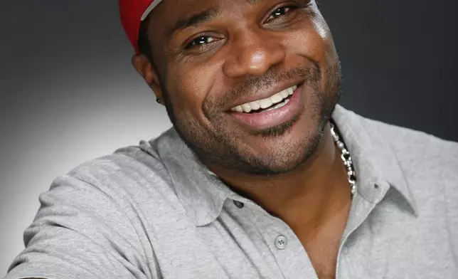 FILE - Actor and musician Malcolm-Jamal Warner poses for a portrait in Los Angeles, Oct. 8, 2015. (Photo by Danny Moloshok/Invision/AP, File)