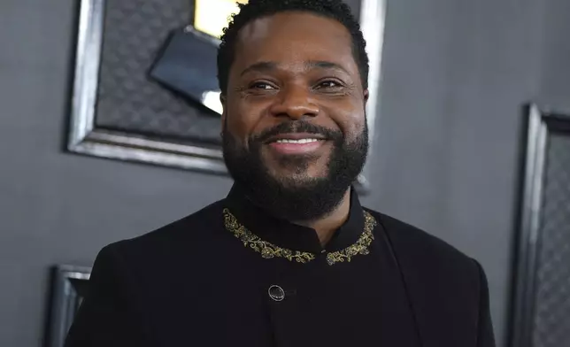 FILE - Malcolm-Jamal Warner arrives at the 65th annual Grammy Awards, Feb. 5, 2023, in Los Angeles. (Photo by Jordan Strauss/Invision/AP, File)