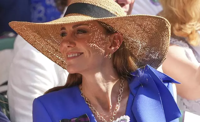 Britain's Kate, Princess of Wales, watches Jannik Sinner of Italy and Carlos Alcaraz of Spain during their men's singles final match at the Wimbledon Tennis Championships in London, Sunday, July 13, 2025.(AP Photo/Kirsty Wigglesworth)