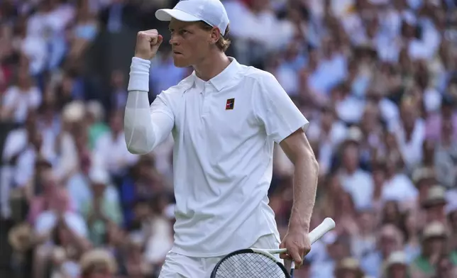Jannik Sinner of Italy reacts during the men's singles final match against Carlos Alcaraz of Spain at the Wimbledon Tennis Championships in London, Sunday, July 13, 2025.(AP Photo/Kirsty Wigglesworth)
