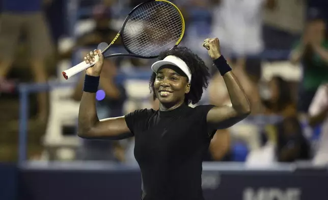 Venus Williams celebrates her win over Peyton Stearns during a match at the Citi Open tennis tournament Tuesday, July 22, 2025, in Washington. (AP Photo/Nick Wass)