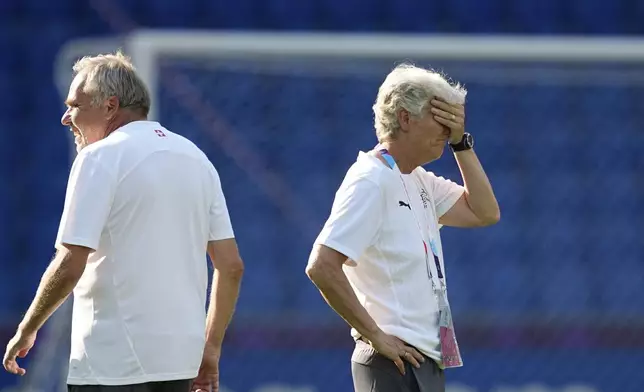 Switzerland head coach Pia Sundhage, right, directs a training session of Switzerland's team ahead of their the Euro 2025, group A, soccer match with Norway, at St. Jakob-Park in Basel, Switzerland, Tuesday, July 1, 2025. (AP Photo/Martin Meissner)