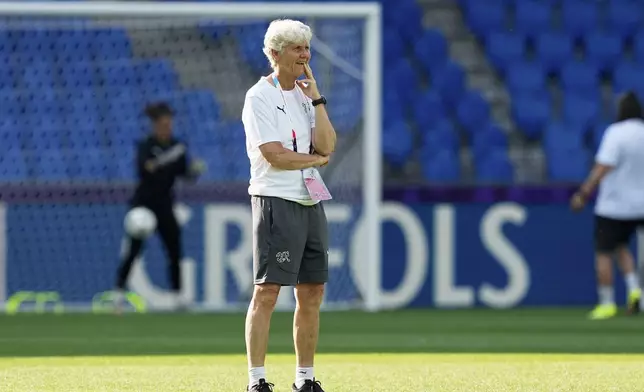 Switzerland head coach Pia Sundhage directs a training session of Switzerland's team ahead of their the Euro 2025, group A, soccer match with Norway, at St. Jakob-Park in Basel, Switzerland, Tuesday, July 1, 2025. (AP Photo/Martin Meissner)