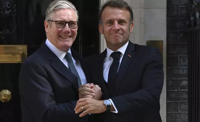 French President Emmanuel Macron meets Britain's Prime Minister Keir Starmer at 10 Downing Street in London, Thursday, July 10, 2025 for a UK-France summit.(AP Photo/Thomas Krych)