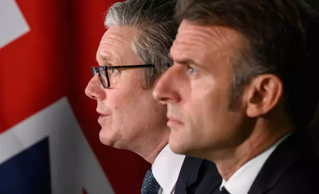 British Prime Minister Keir Starmer, left, and French President Emmanuel Macron, host a meeting of the Coalition of the Willing during a joint military visit to the Northwood Headquarters, in London, Thursday July 10, 2025. (Leon Neal/Pool Photo via AP)