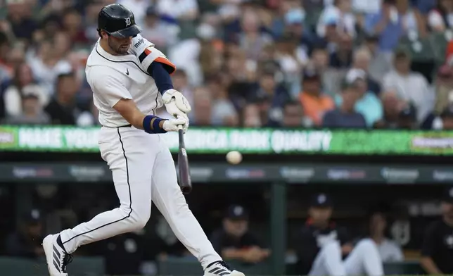Detroit Tigers' Matt Vierling hits a double to score Dillon Dingler during the fourth inning of a baseball game against the Arizona Diamondbacks, Monday, July 28, 2025, in Detroit. (AP Photo/Ryan Sun)