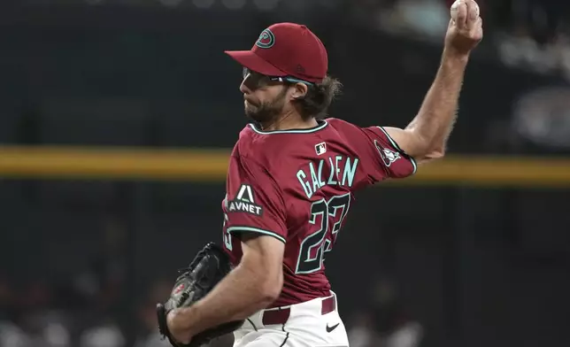 Arizona Diamondbacks pitcher Zac Gallen throws against the San Francisco Giants in the first inning during a baseball game, Tuesday, July 1, 2025, in Phoenix. (AP Photo/Rick Scuteri)