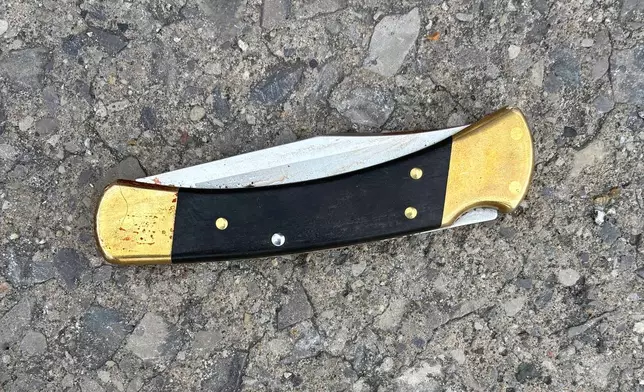This photo provided by the Grand Traverse County Sheriff's Office on Sunday, July 27, 2025, shows the knife that authorities say was used to stab 11 people at a Walmart on Saturday, July 26, in Traverse City, Mich. (Grand Traverse County Sheriff's Office via AP)