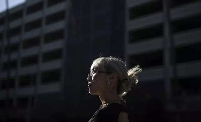 Maria Do, community mobilization manager at the Los Angeles LGBT Center, stands for a photo outside Children's Hospital Los Angeles before a protest against the closure of the hospital's trans youth clinic Thursday, July 3, 2025, in Los Angeles. (AP Photo/Jae C. Hong)