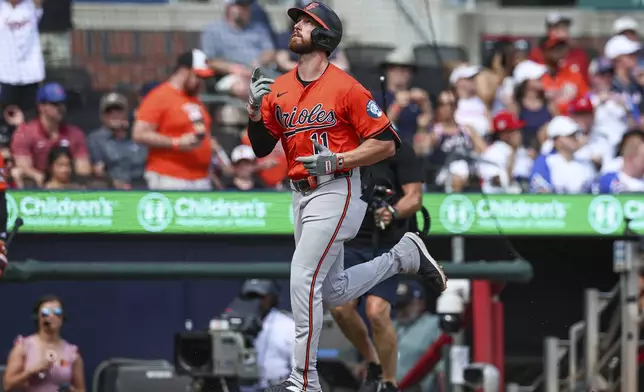 Baltimore Orioles' Jordan Westburg (11) reacts after hitting a two-run home run in the third inning of a baseball game against the Atlanta Braves, Saturday, July 5, 2025, in Atlanta. (AP Photo/Colin Hubbard)