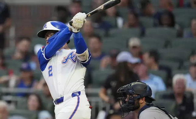 Atlanta Braves shortstop Nick Allen (2) hits an RBI-single in the fourth inning of a baseball game against the New York Yankees, Saturday, July 19, 2025, in Atlanta. (AP Photo/Mike Stewart)