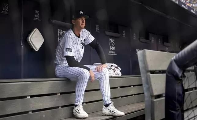 New York Yankees' Ryan McMahon sits in the dugout before a baseball game against the Philadelphia Phillies, Sunday, July 27, 2025, in New York. (AP Photo/Angelina Katsanis)