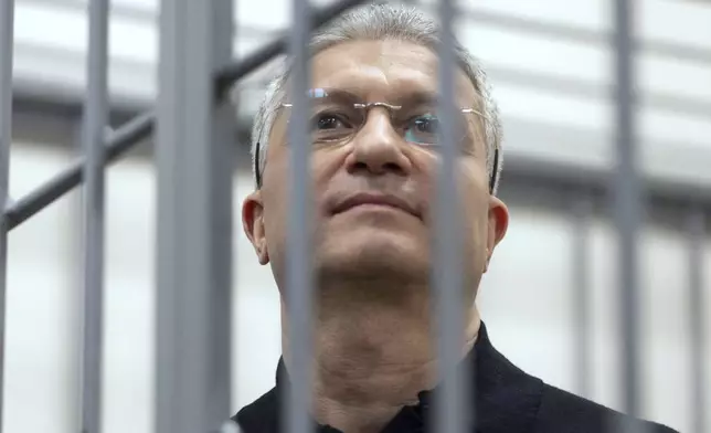 Timur Ivanov, Russia's former deputy defense minister facing corruption charges, stands in the defendant's cage before a hearing, in the Moscow City Court in Moscow, Russia, Tuesday, July 1, 2025. (AP Photo)