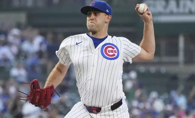 Chicago Cubs starting pitcher Matthew Boyd throws against the Kansas City Royals during the first inning of a baseball game in Chicago, Tuesday, July 22, 2025. (AP Photo/Nam Y. Huh)