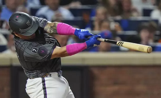New York Mets' Francisco Alvarez hits a two-run home run during the fifth inning of a baseball game against the Los Angeles Angels Tuesday, July 22, 2025, in New York. (AP Photo/Frank Franklin II)