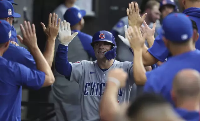 Chicago Cubs third baseman Matt Shaw (6) celebrates a two run home run during the seventh inning of a baseball game between the Chicago Cubs and Chicago White Sox, Saturday, July 26, 2025, in Chicago. (AP Photo/Talia Sprague)
