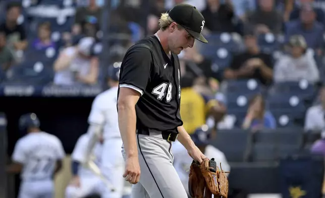 Chicago White Sox pitcher Jonathan Cannon walks to the dugout after the first inning of a baseball game against the Tampa Bay Rays Wednesday, July 23, 2025, in Tampa, Fla. (AP Photo/Jason Behnken)