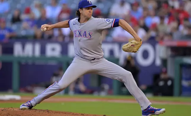 Texas Rangers starting pitcher Jacob deGrom delivers to the plate during the first inning of a baseball game against the Los Angeles Angels, Monday, July 7, 2025, in Anaheim, Calif. (AP Photo/Jayne Kamin-Oncea)