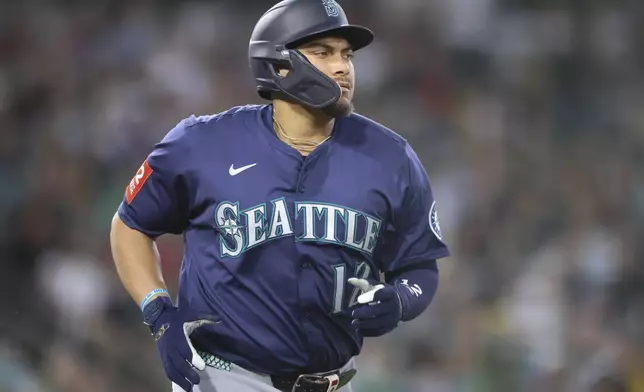 Seattle Mariners' Josh Naylor looks on as he files out during the fifth inning of a baseball game against the Athletics, Monday, July 28, 2025, in West Sacramento, Calif. (AP Photo/Scott Marshall)