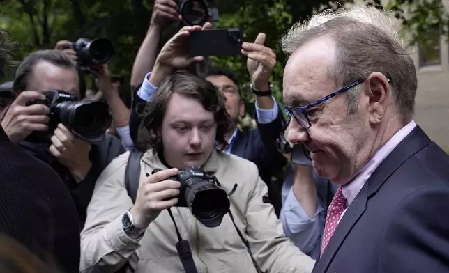 FILE - Actor Kevin Spacey leaves Southwark Crown Court in London, July 26, 2023. In 2023, a London jury acquitted the Oscar-winning actor on sexual assault charges stemming from allegations by four men dating back 20 years. (AP Photo/Alberto Pezzali, File)