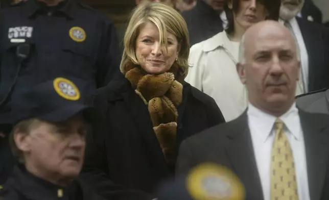 FILE - Martha Stewart leaves Manhattan Federal Court after guilty verdicts in her federal stock fraud trial in New York, March 5, 2004. (AP Photo/Bebeto Matthews, File)