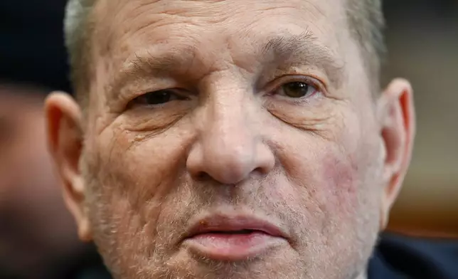 FILE - Harvey Weinstein appears in Manhattan criminal court during his retrial, June 11, 2025, in New York. Weinstein was convicted of rape and other charges in 2022 by a Los Angeles jury. He was sentenced then to 16 years in prison and is appealing that conviction. (Angela Weiss/Pool Photo via AP)