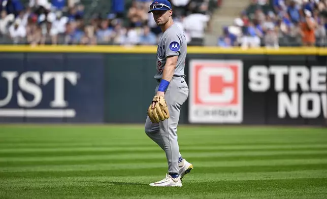 Chicago Cubs second baseman Nico Hoerner looks on during the ninth inning of a baseball game against the Chicago White Sox, Sunday, July, 27, 2025, in Chicago. (AP Photo/Matt Marton)