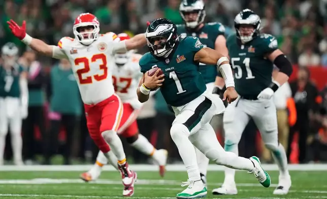 FILE - Philadelphia Eagles quarterback Jalen Hurts (1) runs the ball against the Kansas City Chiefs during the second half of the NFL Super Bowl 59 football game, Sunday, Feb. 9, 2025, in New Orleans. (AP Photo/Brynn Anderson, File)