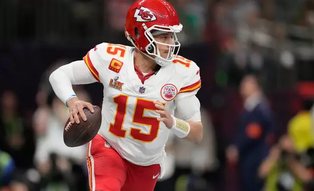 FILE - Kansas City Chiefs quarterback Patrick Mahomes looks to throw against the Philadelphia Eagles during the first half of the NFL Super Bowl 59 football game, Sunday, Feb. 9, 2025, in New Orleans. (AP Photo/Brynn Anderson, File)