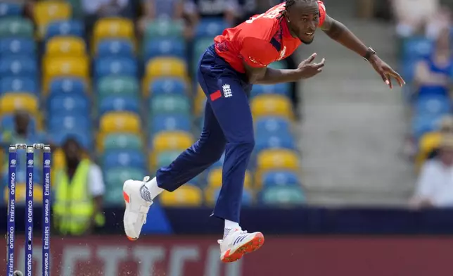 FILE - England's Jofra Archer bowls against Scotland during an ICC Men's T20 World Cup cricket match at Kensington Oval in Bridgetown, Barbados, Tuesday, June 4, 2024. (AP Photo/Ricardo Mazalan, File)