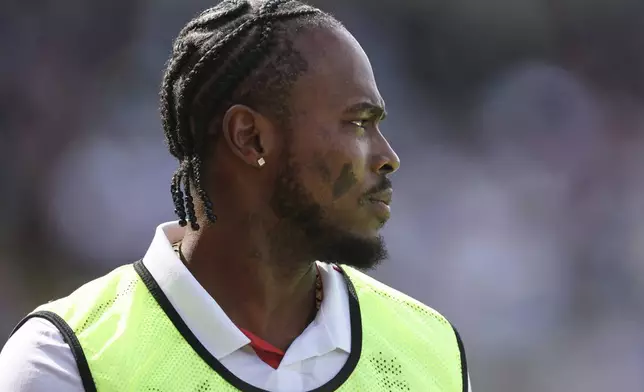 England's Jofra Archer walks during a drinks break on day one of the second cricket test match between England and India at Edgbaston in Birmingham, England, Wednesday, July 2, 2025. (AP Photo/Scott Heppell)