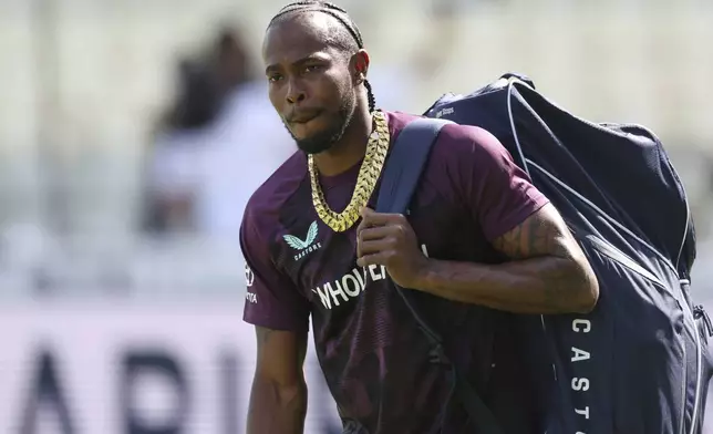 England's Jofra Archer walks onto the field before the start of play on day two of the second cricket test match between England and India at Edgbaston in Birmingham, England, Thursday, July 3, 2025. (AP Photo/Scott Heppell)