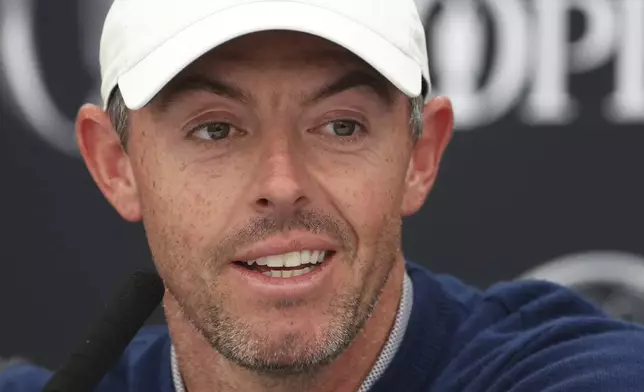 Rory McIlroy of Northern Ireland listens to a question from the media at a press conference ahead of the 2025 British Open golf championship at the Royal Portrush Golf Club, Northern Ireland, Monday, July 14, 2025. (AP Photo/Peter Morrison)