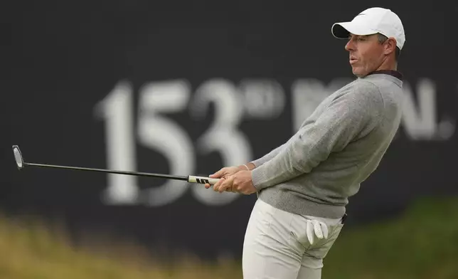 Rory McIlroy of Northern Ireland reacts after putting on the 18th green during the first round of the British Open golf championship at the Royal Portrush Golf Club, Northern Ireland, Thursday, July 17, 2025. (AP Photo/Francisco Seco)