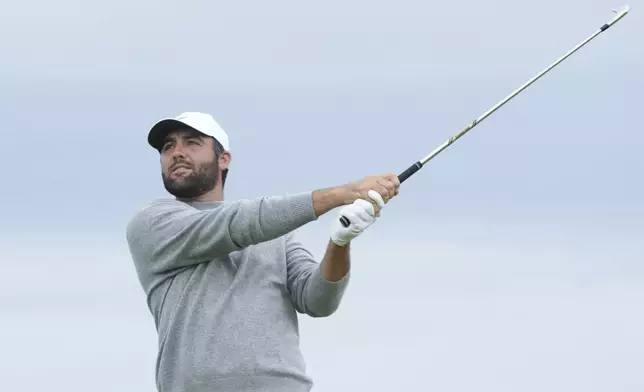 Scottie Scheffler of the United States plays off the 6th tee during the first round of the British Open golf championship at the Royal Portrush Golf Club, Northern Ireland, Thursday, July 17, 2025. (AP Photo/Jon Super)