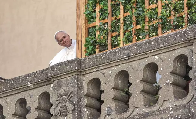 Pope Leo XIV arrives at the papal summer residence in Castel Gandolfo south of Rome for a six-week vacation, Sunday, July 6, 2025. (AP Photo/Andrew Medichini)