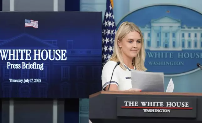 White House press secretary Karoline Leavitt arrives to speak with reporters in the James Brady Press Briefing Room at the White House, Thursday, July 17, 2025, in Washington. (AP Photo/Alex Brandon)