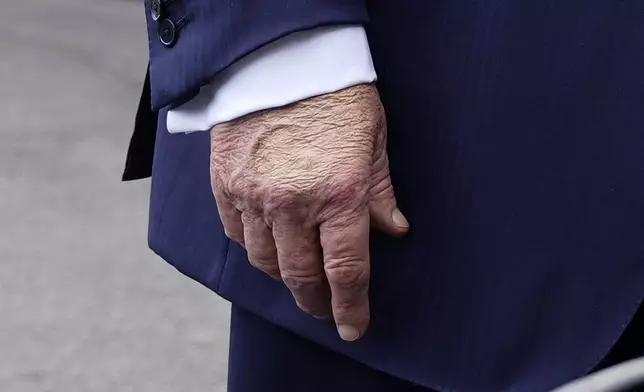 FILE - President Donald Trump speaks to the media as he leaves the White House, July 15, 2025, in Washington. (AP Photo/Manuel Balce Ceneta, File)