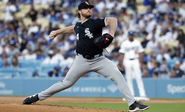 Chicago White Sox pitcher Shane Smith throws against Los Angeles Dodgers during the first inning of a baseball game Tuesday, July 1, 2025, in Los Angeles. (AP Photo/Kevork Djansezian)