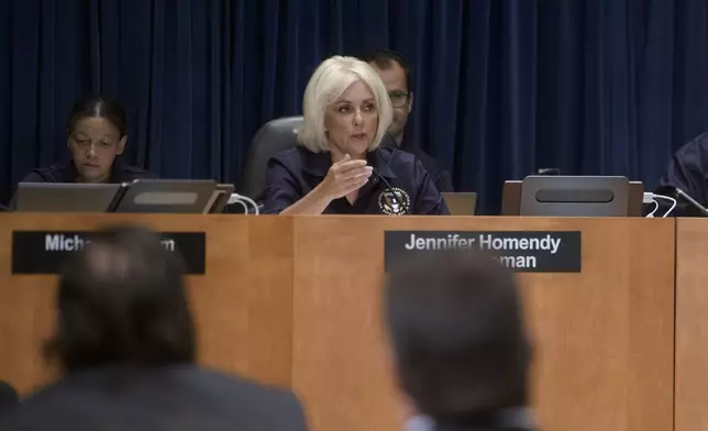 National Transportation Safety Board Chairwoman Jennifer Homendy speaks during the NTSB fact-finding hearing on the DCA midair collision accident, at the National Transportation and Safety Board boardroom, Wednesday, July 30, 2025, in Washington. (AP Photo/Rod Lamkey, Jr.)