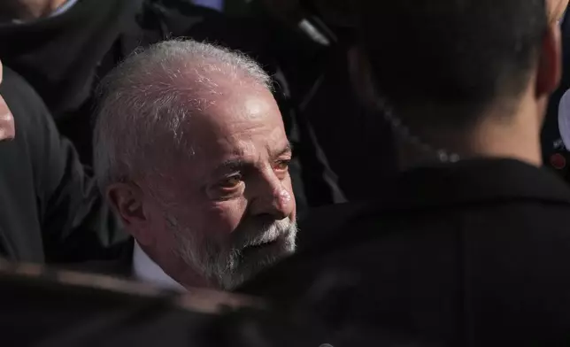 Brazil's President Luiz Inacio Lula da Silva leaves the home of former President Cristina Fernandez, who is under house arrest and serving a six-year prison sentence for corruption, after visiting her while in Buenos Aires, Argentina, for the Mercosur Summit, Thursday, July 3, 2025. (AP Photo/Rodrigo Abd)