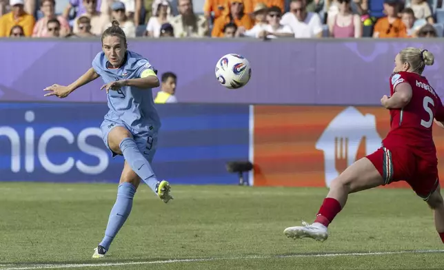 Vivianne Miedema, from Netherlands scores the opening goal, her 100th for the Netherlands, during the Euro 2025, group D, soccer match between Wales and the Netherlands in Lucerne, Switzerland, Saturday, July 5, 2025. (Urs Flueeler/Keystone via AP)