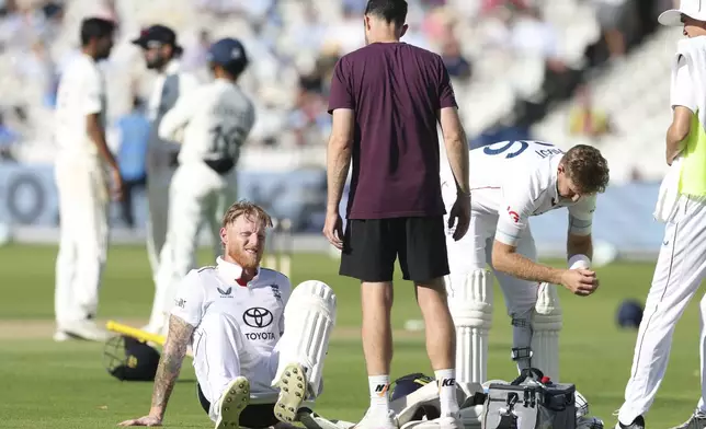 England's captain Ben Stokes rests on the ground after an injury during the third cricket test match between England and India at Lord's cricket ground in London, Thursday, July 10, 2025. (AP Photo/Richard Pelham)